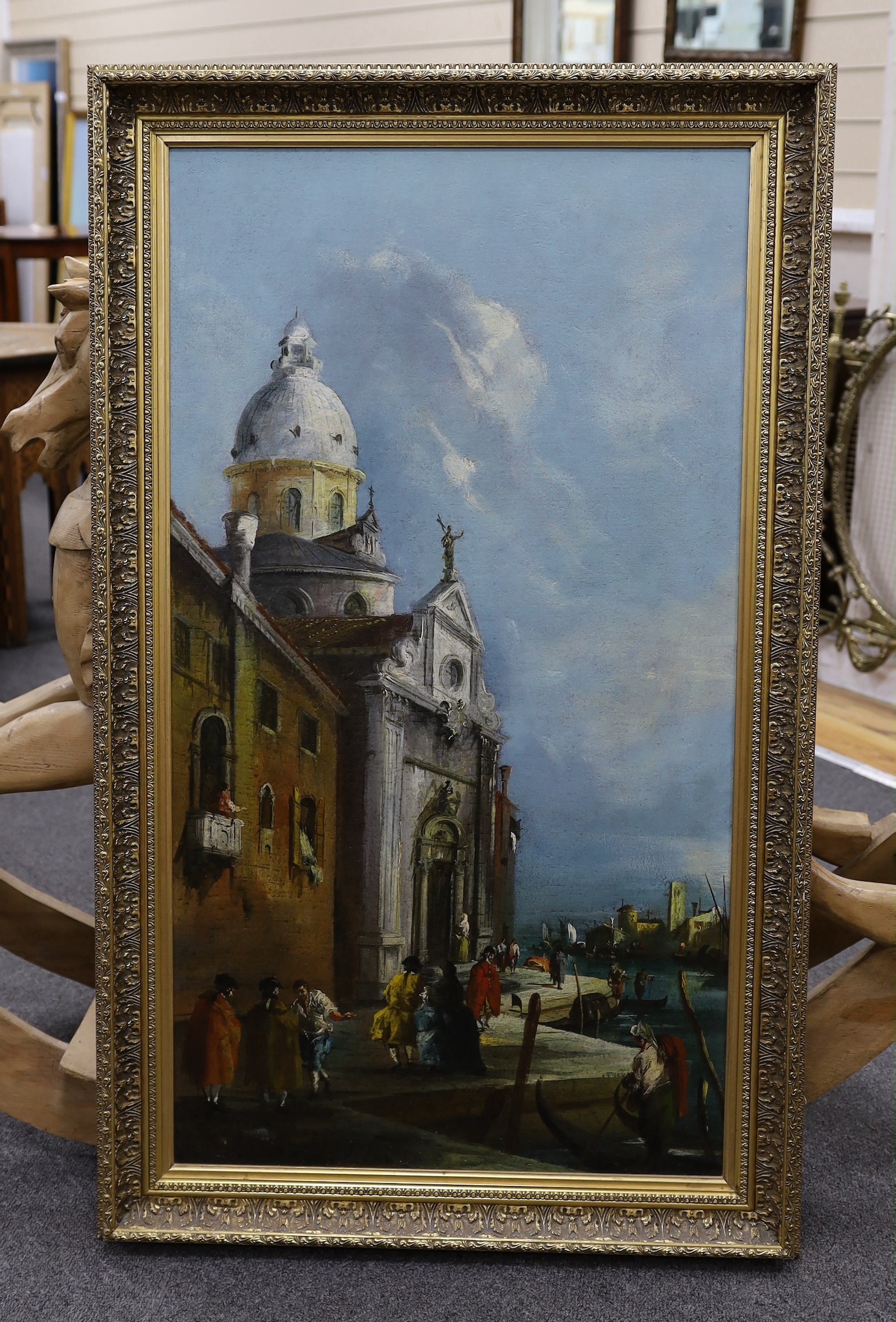 After Guardi, oil on canvas, Figures beside a Venetian church, 97 x 53cm